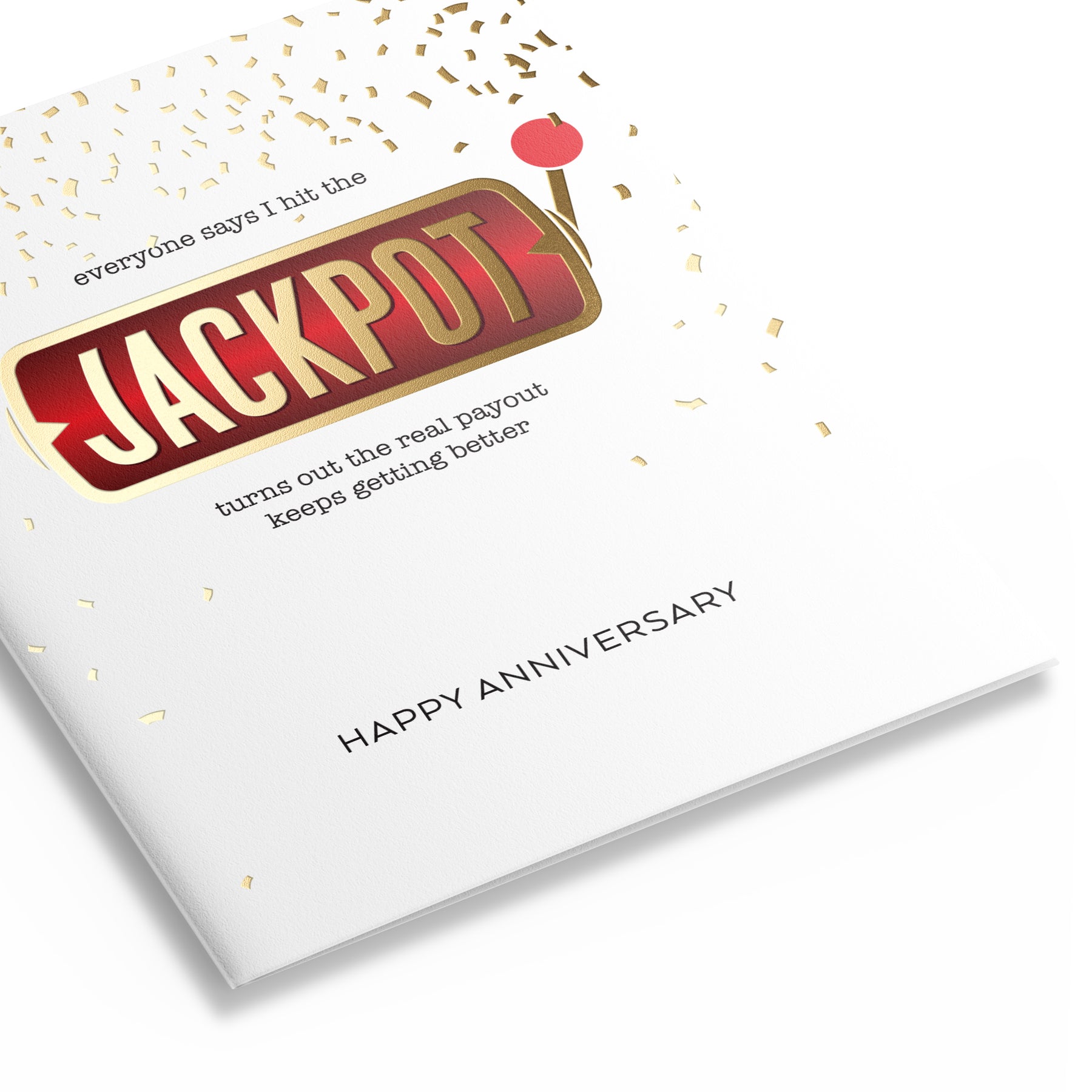Three quarter view of anniversary card featuring a slot machine handle and confetti that reads "everyone says I hit the JACKPOT turns out the real payout keeps getting better" HAPPY ANNIVERSARY
