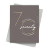 Greeting card with '7 sensational and seventy happy birthday' text on a gray background