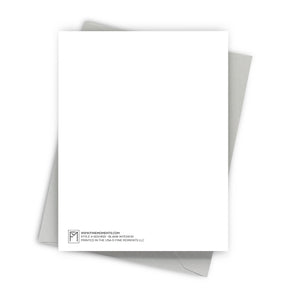 White greeting card with a gray envelope on a white background
