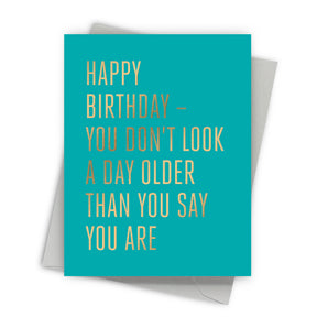 Modern birthday card with gold foil text on a white background