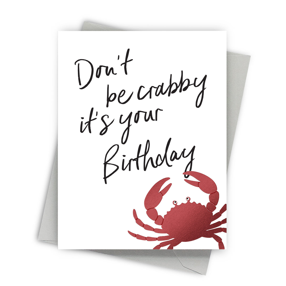 Greeting card with red crab and text 'Don't be crabby it's your birthday' on a white background