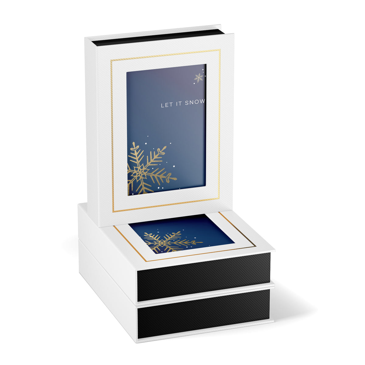 White box set of cards with gold snowflake design and 'LET IT SNOW' text on a blue background