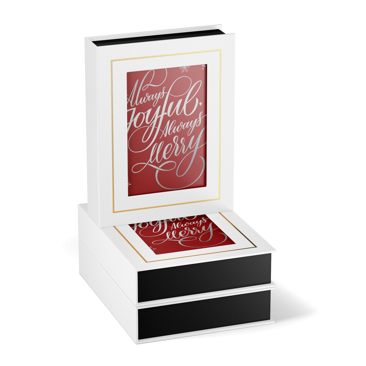 While box containing holiday cards with hand lettered text that reads always joyful always merry.