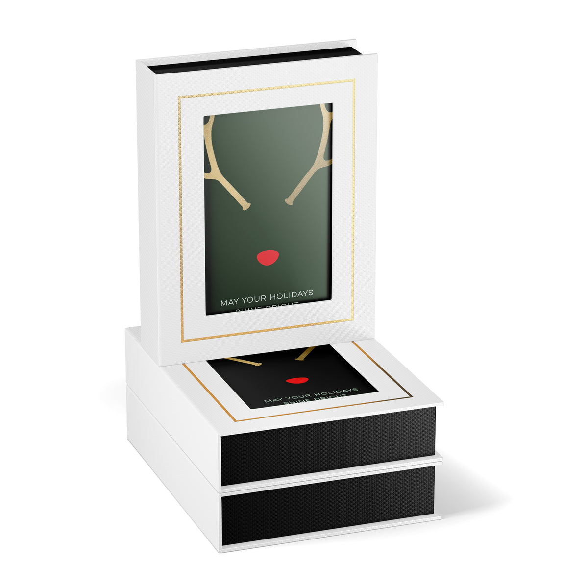 White colored box containing modern holiday cards with reminder antlers and a red note that says "may your holidays shine bright." 