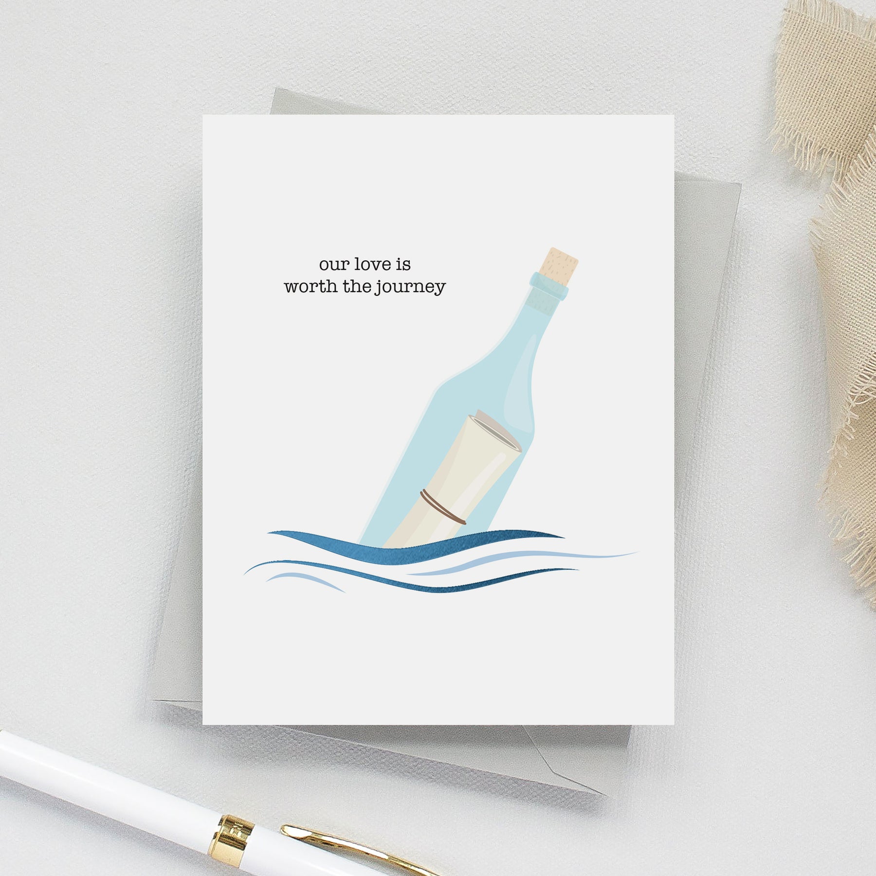Greeting card with a bottle and message design on a white background
